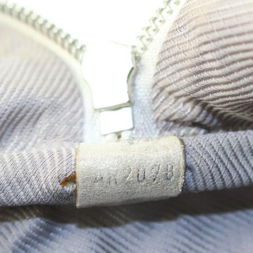 Louis Vuitton made bag scratches